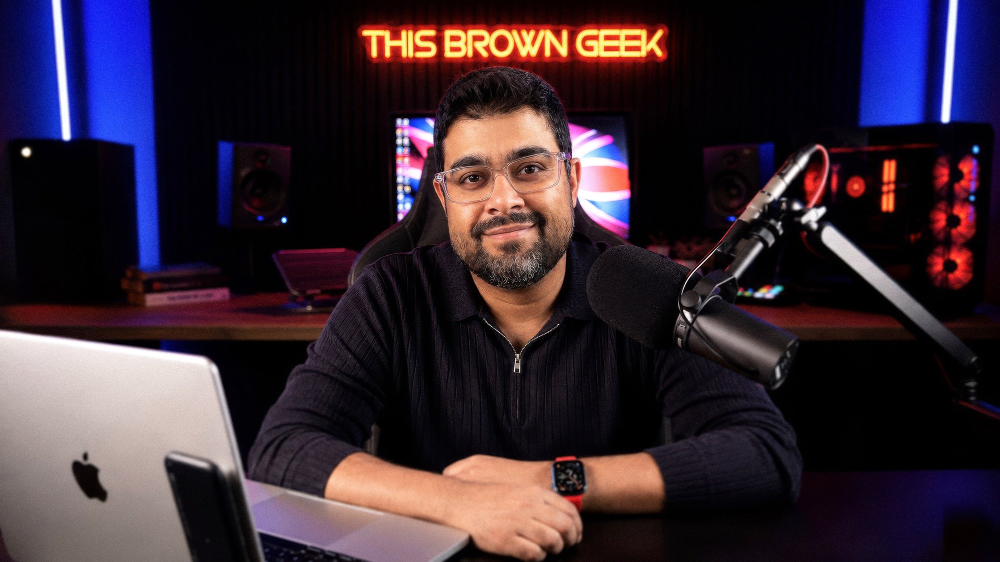Kay at the desk in the This Brown Geek London studio
